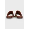 Brown leather flip flops