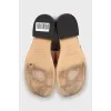 Brown leather flip flops