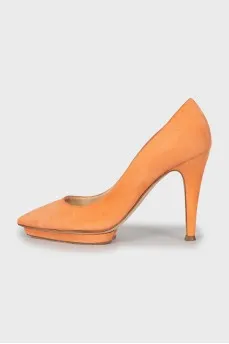 Orange suede pumps