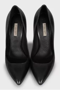 Black leather pumps