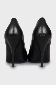 Black leather pumps