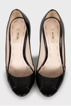 Shoes with decorative stitching on the sole