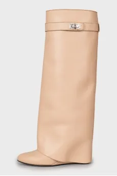 High boots made of beige leather