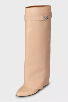 High boots made of beige leather