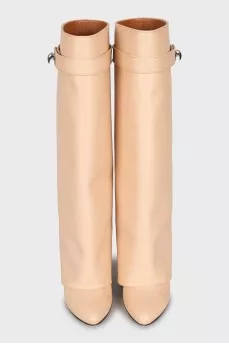 High boots made of beige leather