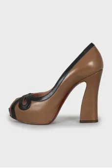 Brown leather high heel shoes