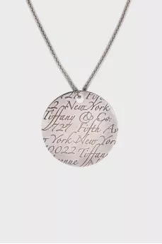 Silver pendant with engraving