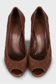 Brown leather shoes with perforation