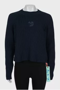 Jumper with branded embroidery and tag