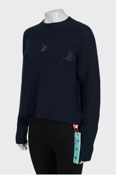 Jumper with branded embroidery and tag