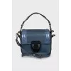 Leather blue bag with keychain