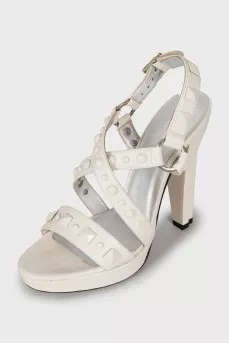 White sandals with metallic decor