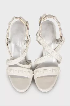 White sandals with metallic decor