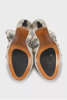 White sandals with metallic decor