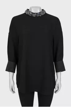 Dress with decorated collar