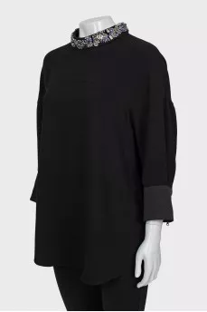 Dress with decorated collar
