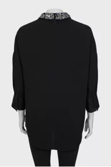 Dress with decorated collar