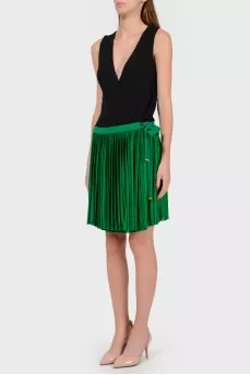 Dress with a green pleated skirt