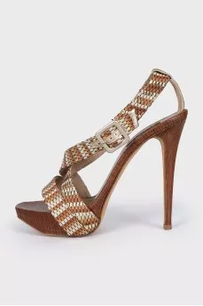 Brown leather and wood sandals