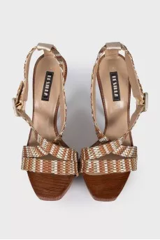 Brown leather and wood sandals
