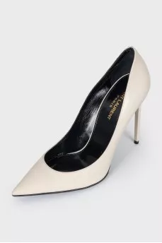 White leather pumps