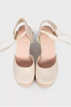 Beige wedge shoes
