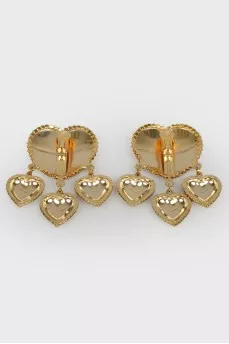 Clip-on earrings in the shape of hearts with stones