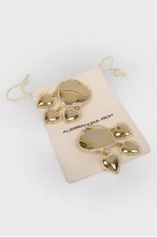 Clip-on earrings in the shape of hearts with stones