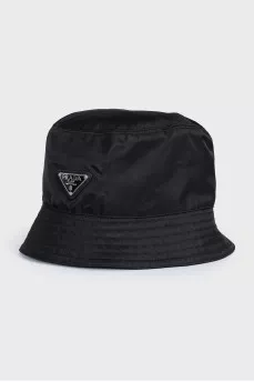Panama hat with metal logo and tag