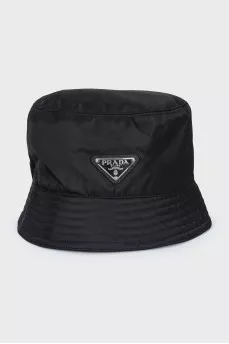 Panama hat with metal logo and tag