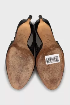 Patent leather slingbacks with golden bow