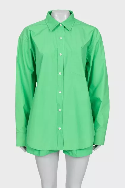 Green suit of shirt and shorts