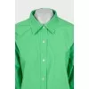 Green suit of shirt and shorts