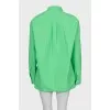 Green suit of shirt and shorts