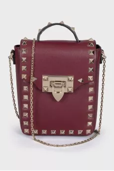 Red bag with metal decor