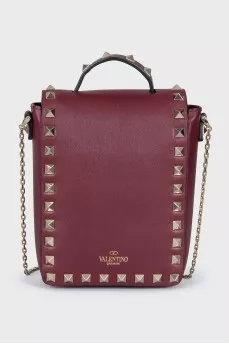 Red bag with metal decor
