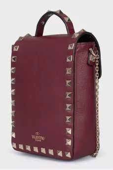 Red bag with metal decor