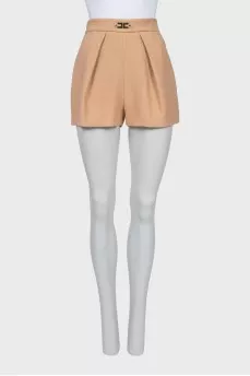 Beige shorts with gold decor