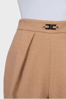 Beige shorts with gold decor