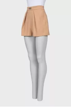 Beige shorts with gold decor