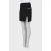 Mini skirt with a slit in the front