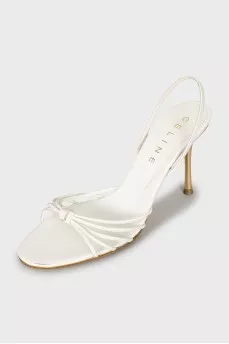 White sandals with golden heels