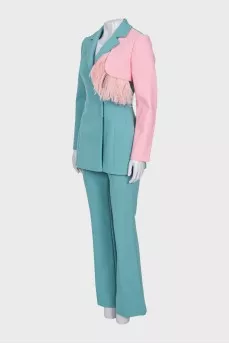 Trouser suit decorated with feathers