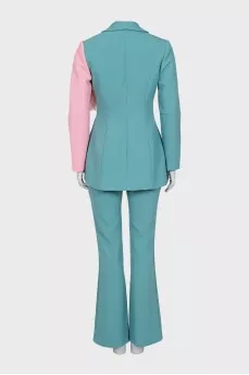 Trouser suit decorated with feathers