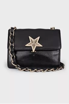 Bag with star shaped clasp