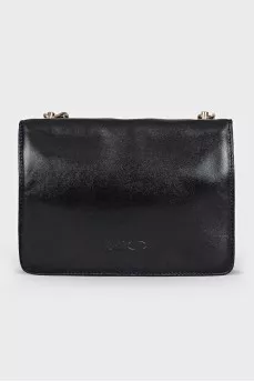 Bag with star shaped clasp
