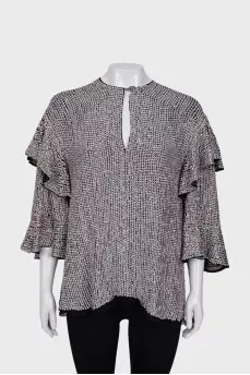 Blouse decorated with silver sequins