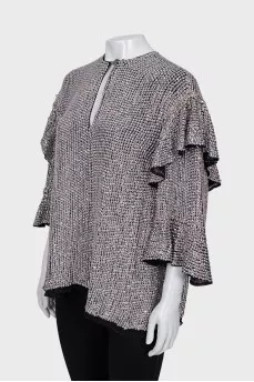 Blouse decorated with silver sequins