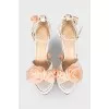 Sandals with braiding decorated with flowers