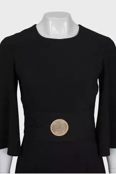 Black dress with gold logo